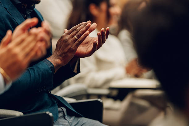 Diverse business people applauding with joy