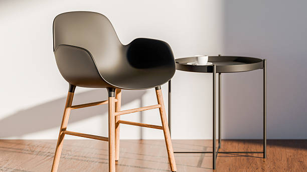 istock Modern chair with wooden legs and small round table 2247007410