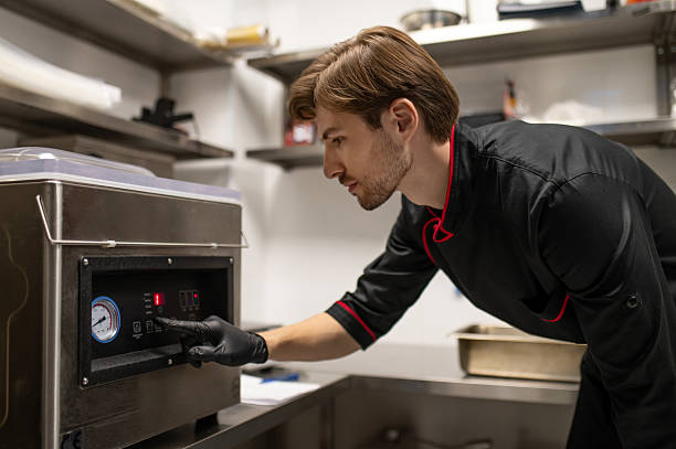 istock Professional cook engaged in food preparation process 2247011882