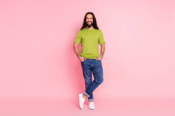 istock Full length body size view of attractive cheerful guy looking aside copy empty space isolated over pink pastel color background 2247012195