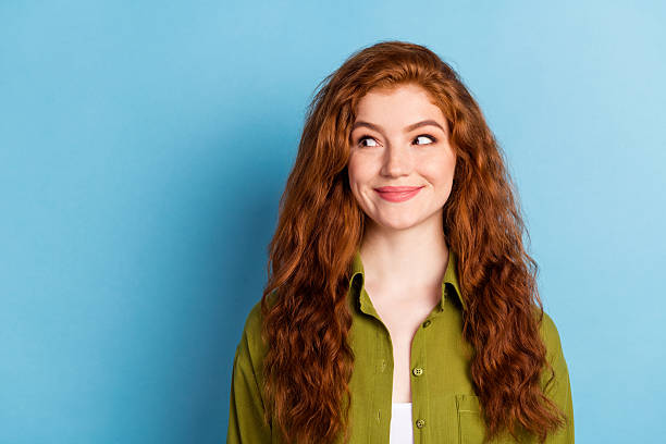 istock Portrait of attractive curious cheery long-haired girl creating solution copy space isolated over bright blue color background 2247012911