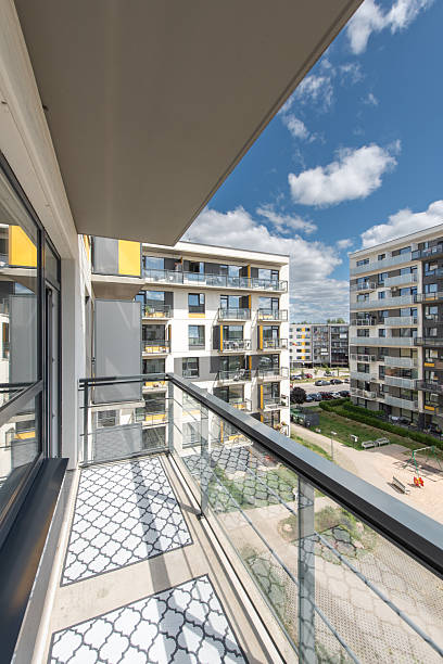 istock Modern Balcony Overlooking a Residential Complex on a Clear Sunny Day 2247014526