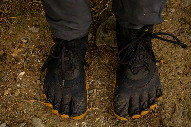 istock Virbram fivefinger barefoot hiking shoes in the woods 2247014809