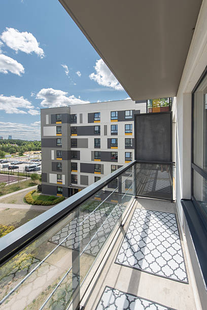 istock Modern Balcony Overlooking a Residential Complex on a Clear Sunny Day 2247014821