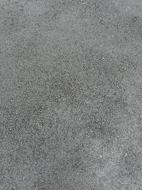 istock Wet Asphalt Paving - Color Portrait Format 2247015544