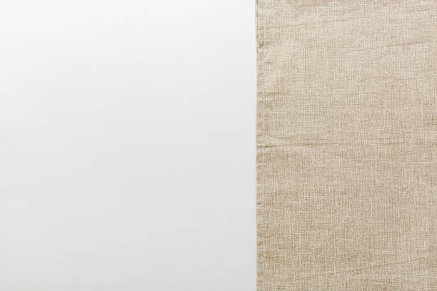istock top view with gray kitchen napkin isolated on table background. Folded cloth for mockup with copy space, Flat lay. Minimal style 2247016856
