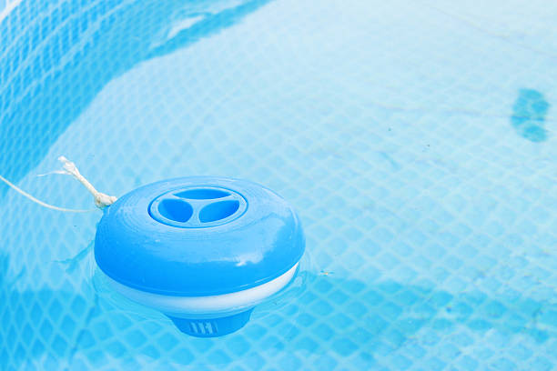 istock Chlorine tablet dispenser floating in Swimming pool . Swimming pool cleaner 2247016927