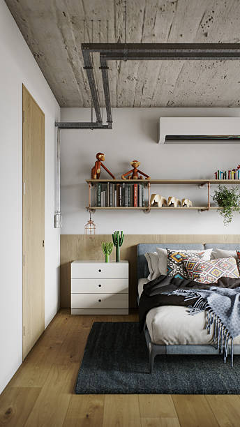 istock Modern Bedroom Corner with Bookshelf, Toys, and Textiles Under Exposed Concrete Ceiling 2247018545