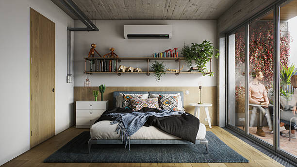 istock Modern Bedroom with Bookshelf, Toys, and Balcony View Under Exposed Concrete Ceiling 2247018550