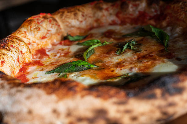 istock Fresh margherita pizza with melted cheese and basil leaves.. 2247019414