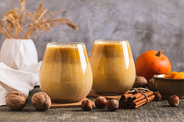 Warming pumpkin nut latte in glasses on the table