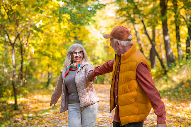 istock Senior couple having fun outdoors in fall season 2247024286
