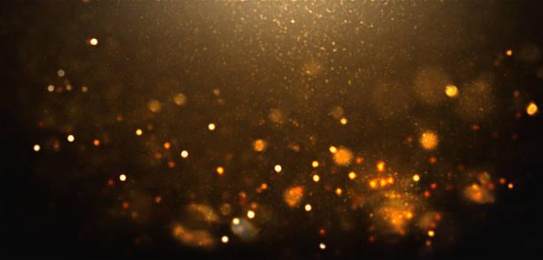 istock Golden bokeh glitter sparks festive background luxury 2247027629