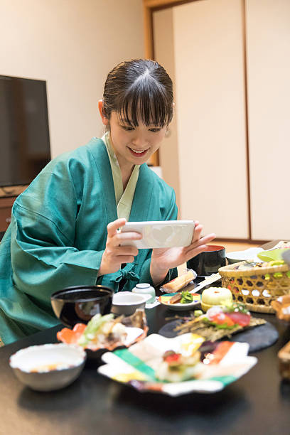 istock Middle-aged women having dinner at a Japanese hotel 2247037391
