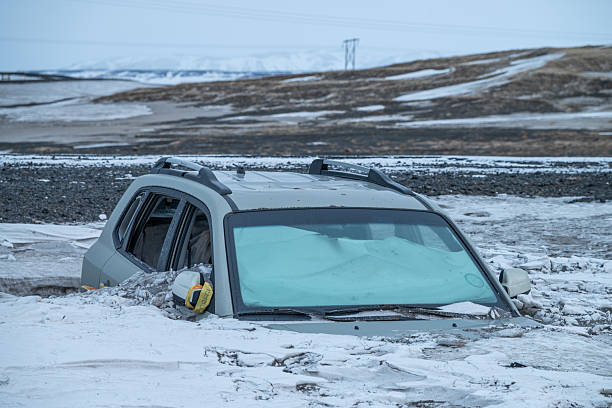 Modrudalur Iceland - December 26. 2024: damaged car stuck in the snow