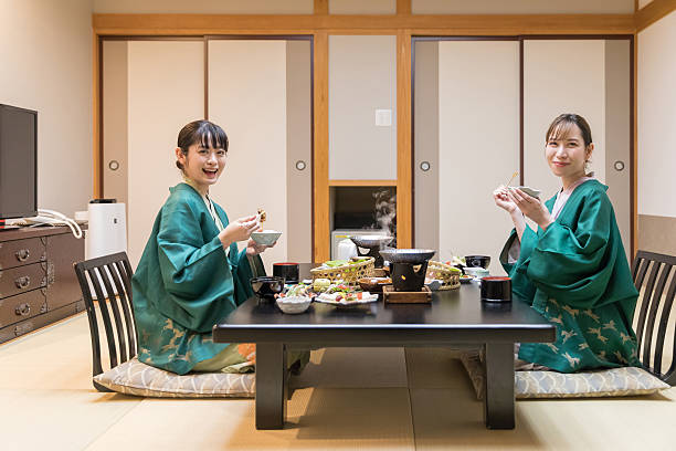 istock Middle-aged women having dinner at a Japanese hotel 2247038878