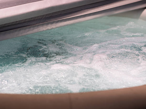 istock Relaxing Hot Tub Experience for Ultimate Comfort 2247040815