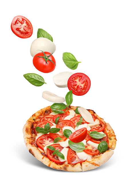 istock Caprese pizza and ingredients in air on white background 2247043135