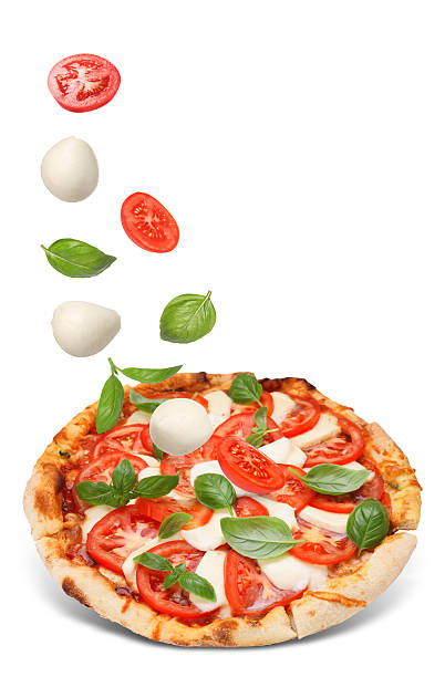istock Caprese pizza and ingredients in air on white background 2247043139
