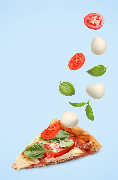 istock Caprese pizza and ingredients in air on light blue background 2247043147