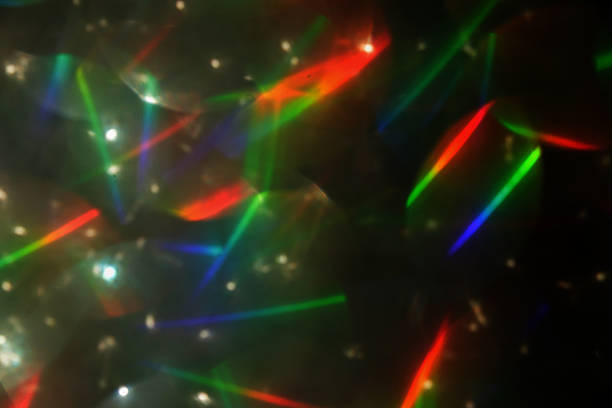 istock Colorful glitter rainbow glow light flare sparks abstract overlay texture 2247045597