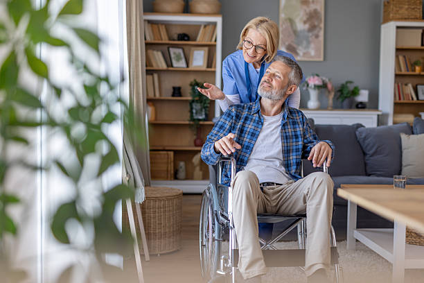 istock Caring interaction between a caregiver and a man in need 2247046783