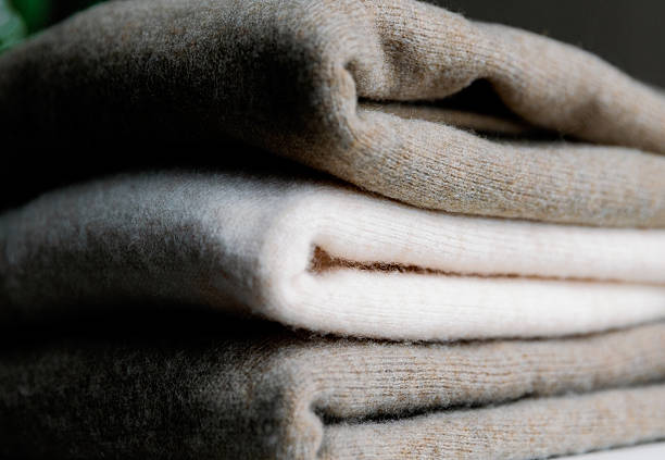 istock Three pieces of stacked cashmere sweaters. 2247050288
