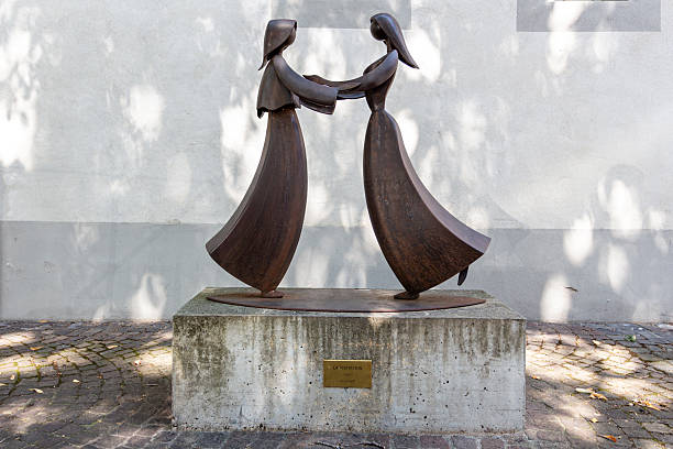 Martigny, Valais, Switzerland - August 10th, 2025: Sculpture La Visitation, by artist Jean-Pierre Augier, at the Eglise Paroissiale Notre-Dame de La Visitation.