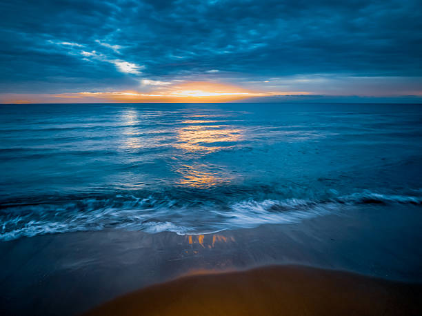 istock Sunrise at the Seaside with rain clouds 2247060735