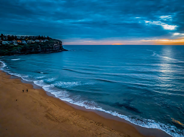 istock Sunrise at the Seaside with rain clouds 2247060803