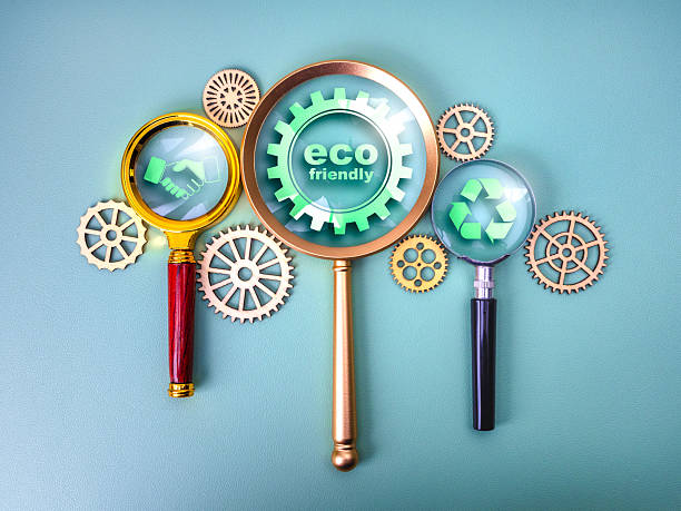 istock Magnifying glasses with eco icons and gears represent eco-friendly system management, green technology, environmental conservation cooperation, sustainable process, and efficient recycling mechanisms. 2247066050