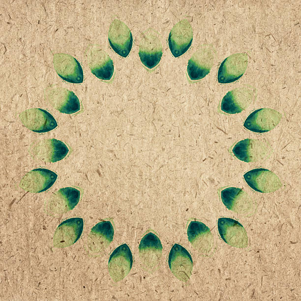 This watercolor leaf print circle frame on recycled kraft paper background creates a decorative botanical wreath border with a natural vintage look and organic handmade charm. The bright green brush prints form a clean, symmetrical pattern that mimics leaf shapes without using real foliage, making it ideal for eco-friendly design, rustic invitations, sustainable packaging, creative greeting cards, labels, scrapbooking, and artisanal brand identity. The warm textured kraft paper and fresh watercolor accents offer a versatile layout with space for text, perfect for seasonal or nature-inspired projects.