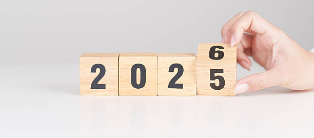 istock 2025 change to 2026 year block on table. goal, Resolution, strategy, plan, start, budget, mission, action, motivation and New Year concepts 2247069058