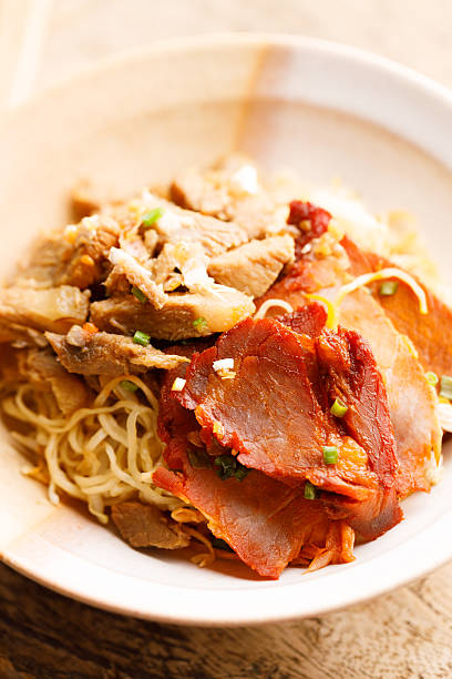 istock Egg Noodles with meat in bowl with chopsticks 2247071162