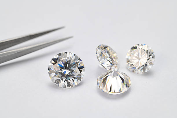 istock Four white diamonds are displayed on a white background 2247073225