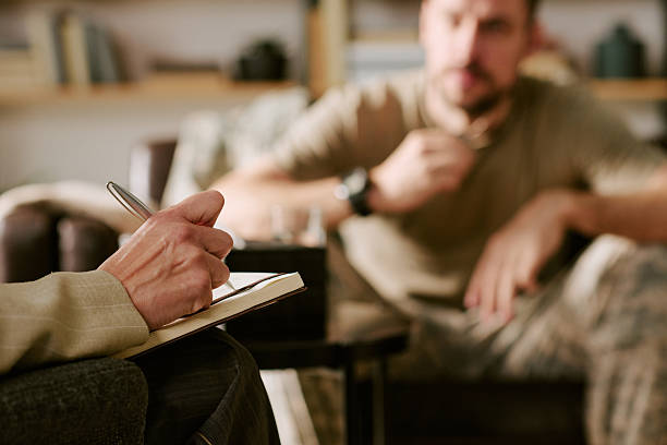 istock Caucasian Middle Aged Man Discussing Personal Issues with Psychologist 2247078007