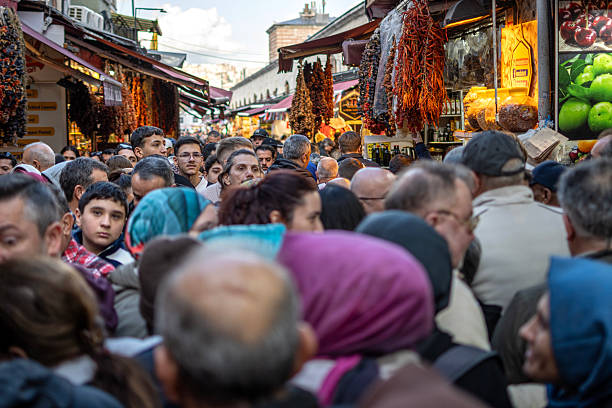 Istanbul, Turkey - November 13, 2025: People walking on Eminonu Square in Istanbul, Turkey