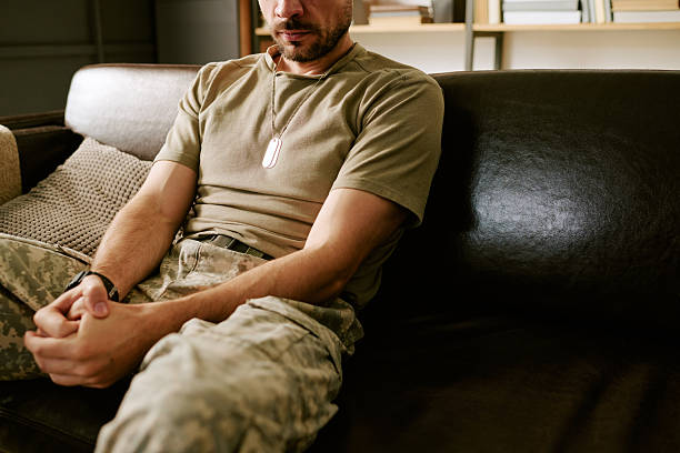 istock Middle Aged Caucasian Man Sitting on Sofa Reflecting on Psychological Issues 2247079874