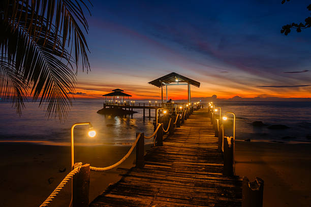 istock Sunset over serene pier on Koh Kood Island, Thailand creating a tranquil atmosphere 2247081146