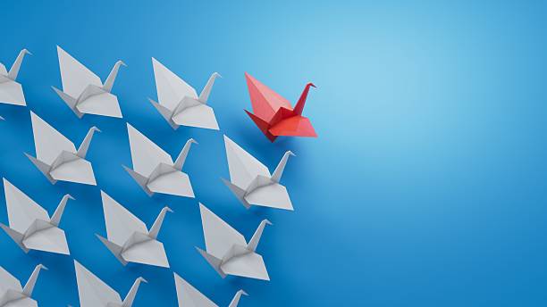 istock Different business concept.new ideas. paper art style. creative idea.red leader swan, standing out from the crowd of white swans.3D rendering on blue background. 2247082633