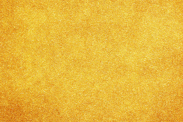 istock gold color glitter paper abstract. natural texture background. retro styled concept. 2247083671