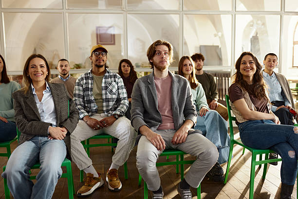 istock Creative colleagues attending a seminar in board room. 2247086644