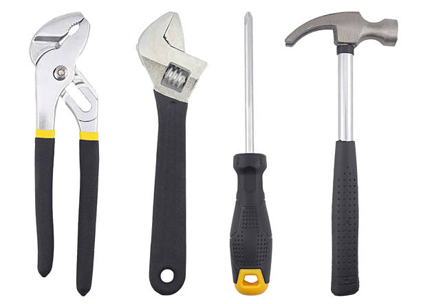 istock A set of essential hand tools including groove joint pliers, an adjustable wrench, a screwdriver, and a claw hammer displayed on a white background, representing repair work, DIY projects, 2247087221
