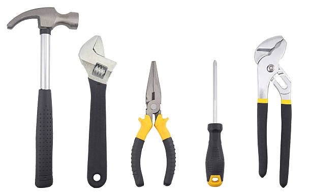 istock A set of essential hand tools including a claw hammer, adjustable wrench, long-nose pliers, screwdriver, and groove joint pliers arranged on a white background, representing repair work, DIY projects, 2247087222