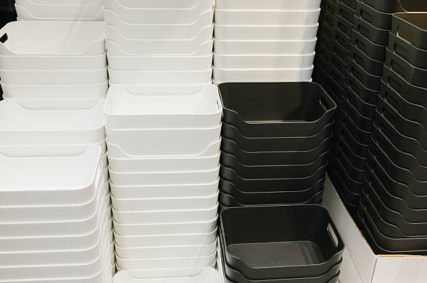 White and black stacked storage bins for home and office organization.