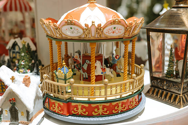 istock Vintage miniature carousel with horses and decorative details 2247087642