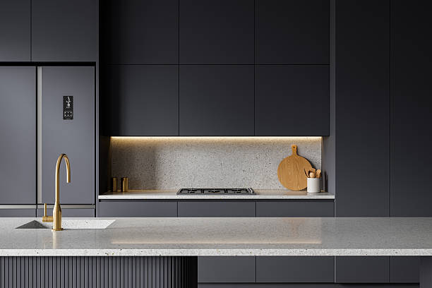 istock Modern matte grey kitchen interior with minimalist design, terrazzo countertops, and golden faucet accent on clean contemporary background. 3D Rendering 2247087931