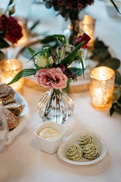 istock Elegant table setting with flowers and candles. 2247090864