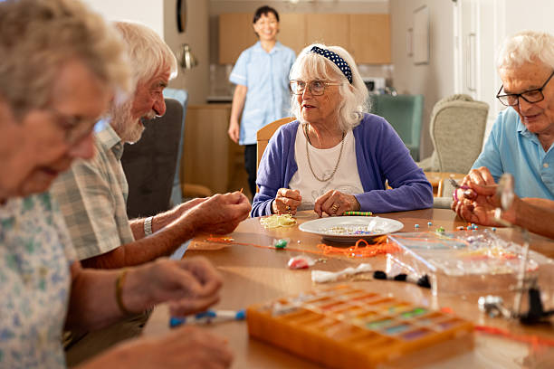 istock Older Adults Engaged in Creative Hobby 2247092359