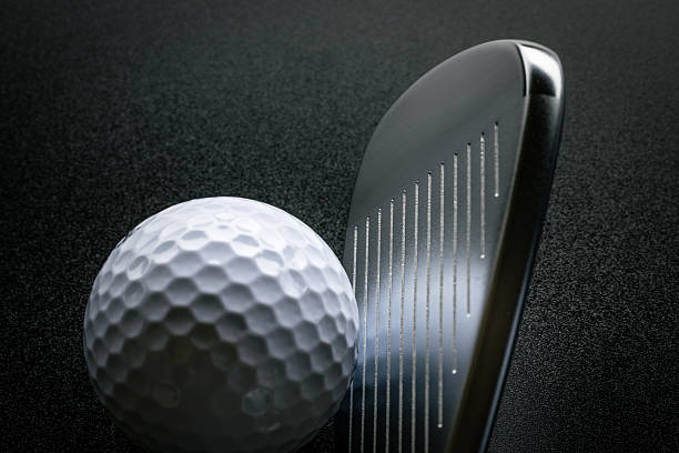 Golf ball with a golf club isolated on white.Click on the link below to see more of my sport images